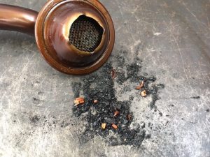 Fine debris emptied from the engine oil pick up strainer