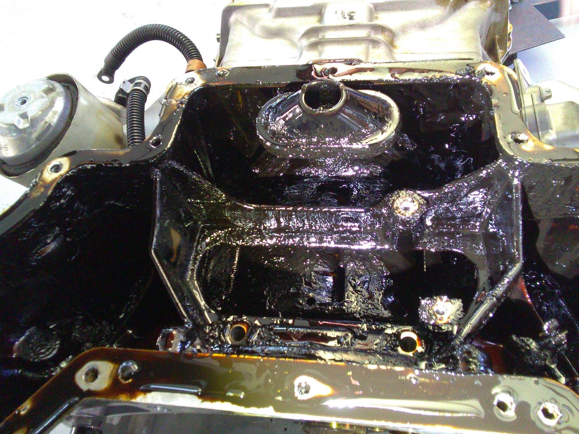 Inside of mercedes engine clogged with black sludge