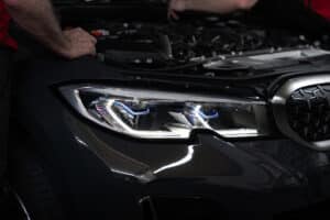 black car with bonnet popped open