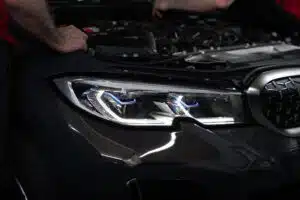 black car with bonnet popped open